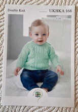 Load image into Gallery viewer, UKHKA DK knitting pattern 168 - Babies Sweater &amp; Cardigans 16-22 ins
