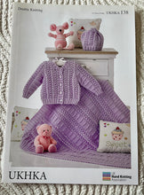 Load image into Gallery viewer, UKHKA DK knitting pattern 138 - Babies Cardigan, Hat &amp; Blanket 12-20ins
