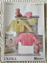 Load image into Gallery viewer, UKHKA DK knitting pattern 137 - Babies Cardigans &amp; Hat 12-20ins
